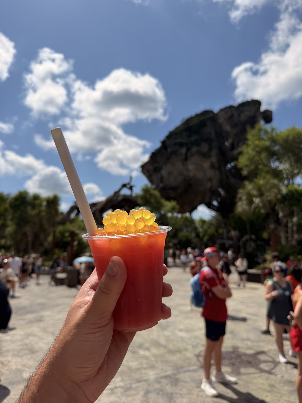 A colorful drink beneath the floating mountains
