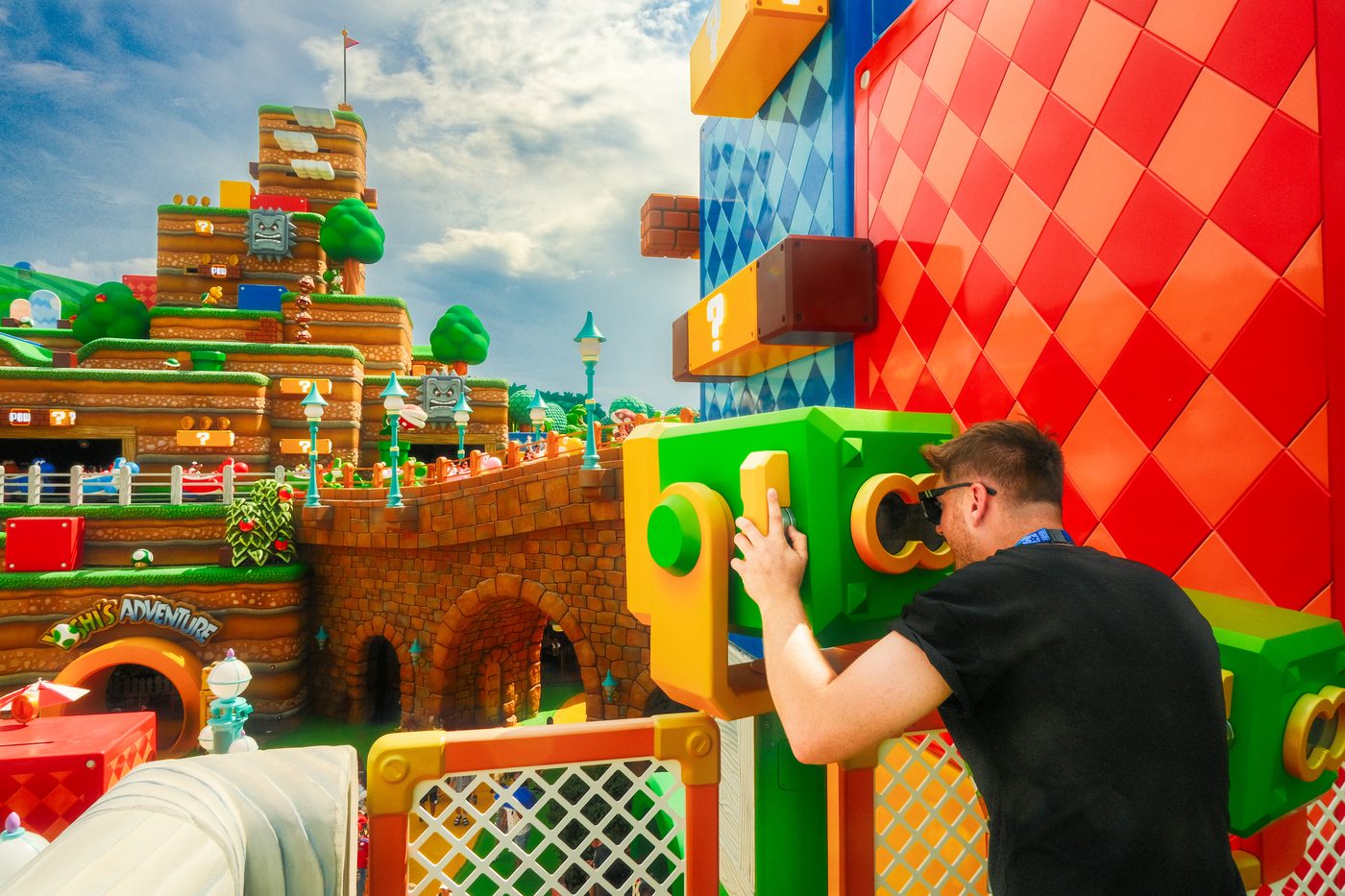 Peeking through a warp pipe in Super Nintendo World