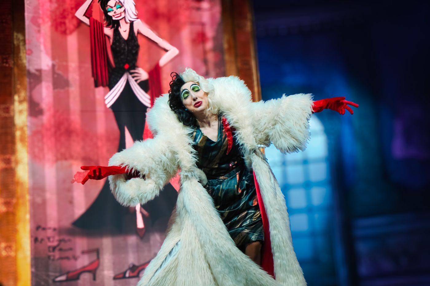 Cruella de Vil struts the villains-show stage