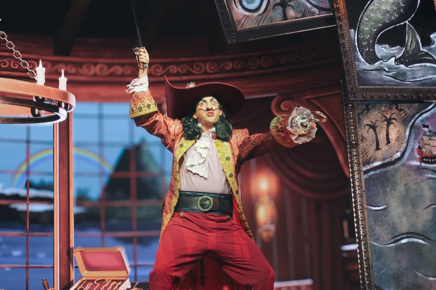 Captain Hook draws his sword in the villains show
