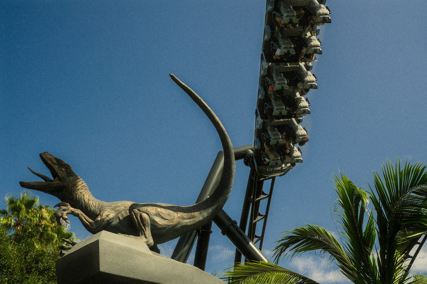 A raptor beneath the VelociCoaster