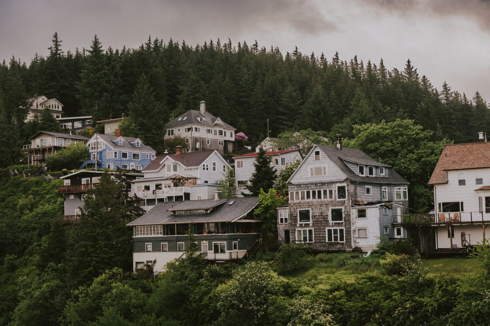 Colorful hillside houses above the water in an Alaskan town