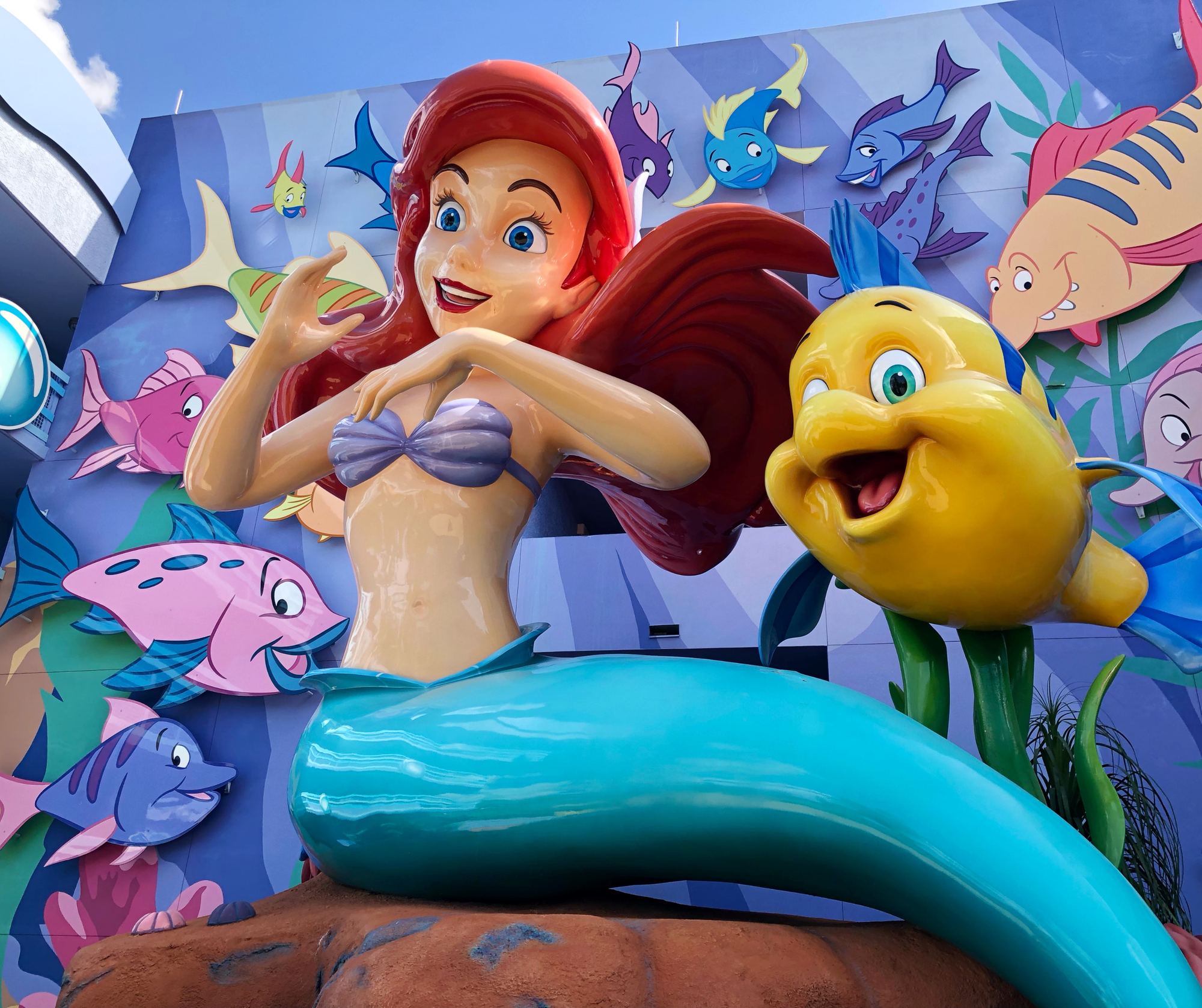 Ariel and Flounder in the Little Mermaid courtyard