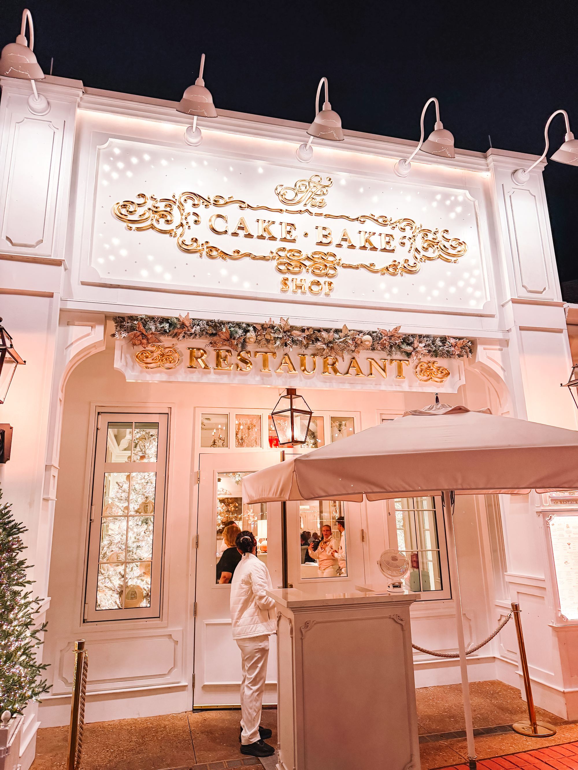 The Cake Bake Shop, aglow on the BoardWalk at night