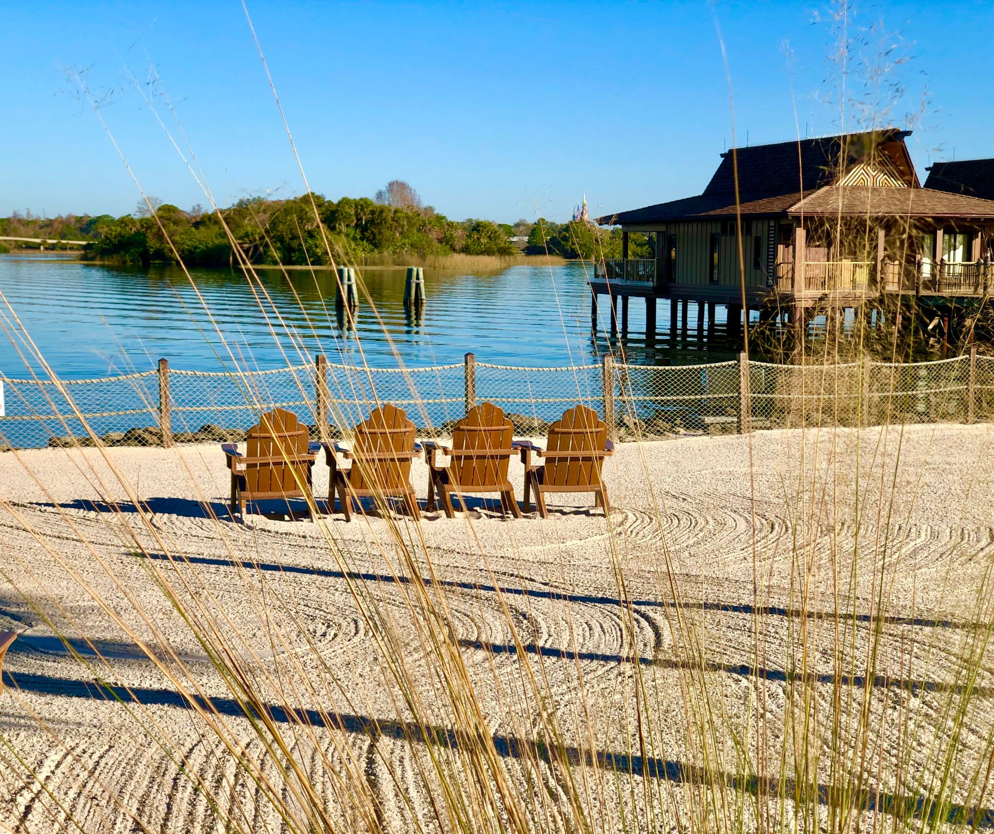 The beach and Bora Bora bungalows at the Polynesian