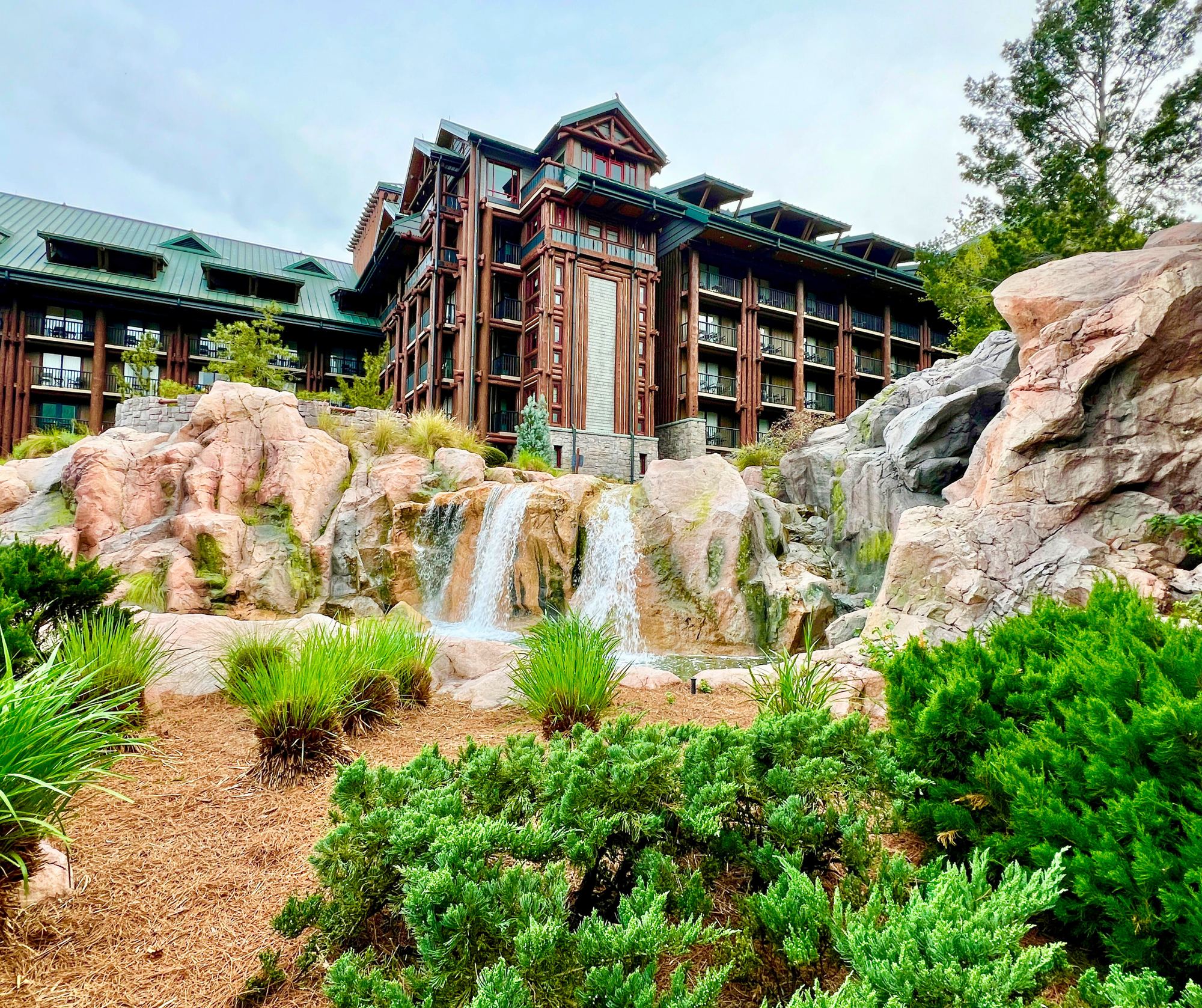Wilderness Lodge above its waterfall rocks